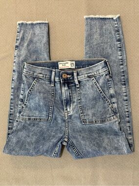abercrombie kids light blue skinny jeans with raw hem